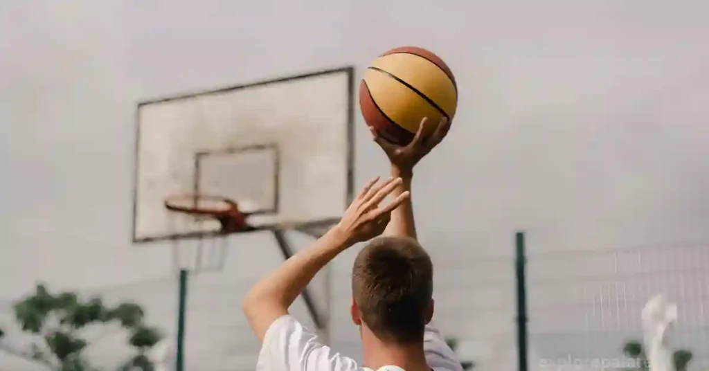 Is it permissible to bring a basketball as hand luggage on an airplane?